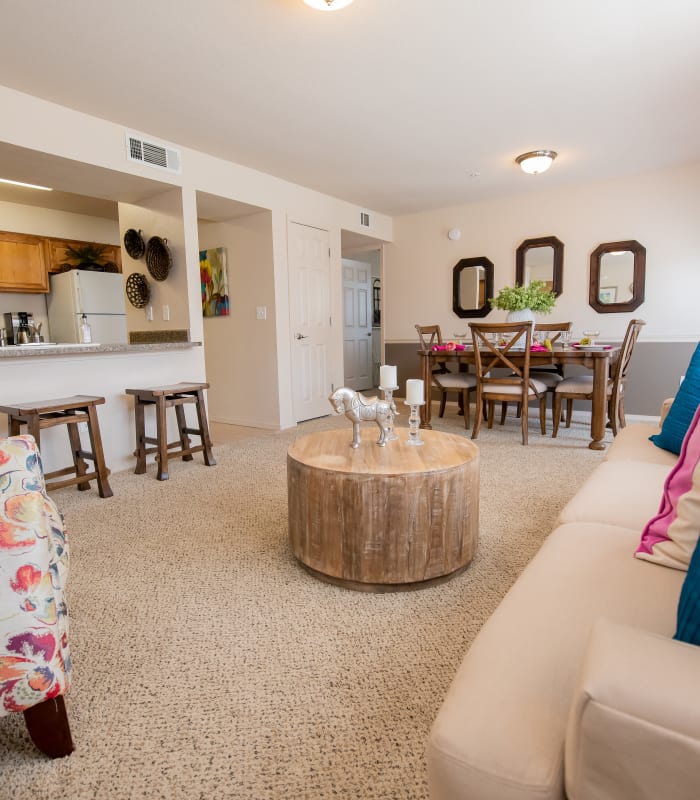 Carpeted living room at Remington Apartments in Amarillo, Texas