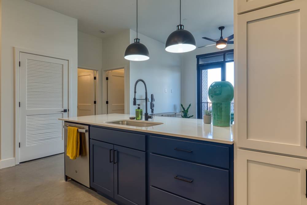 Kitchen with cabinets at Fusion at Neon in Norfolk, Virginia