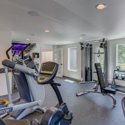 Onsite fitness center with cardio machines and free weights at Sofi Lakeside in Everett, Washington