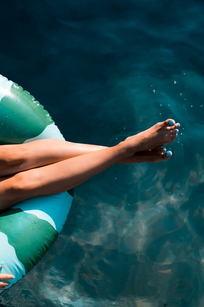 Relaxing in the pool at Lakewood Park Apartments in Lexington, Kentucky