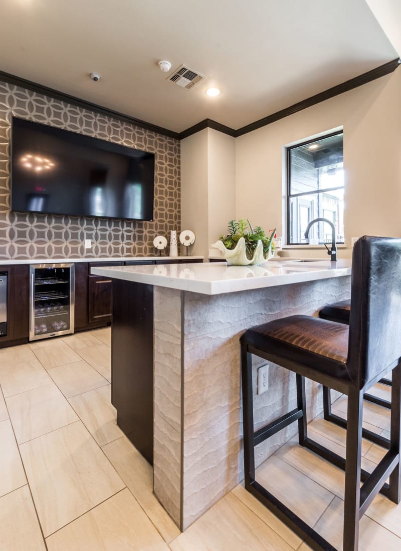 Kitchenette and breakfast bar in clubhouse at Marquis at Stonebriar in Frisco, Texas
