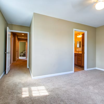 A well-lit bedroom at Heroes Manor in Camp Lejeune, North Carolina