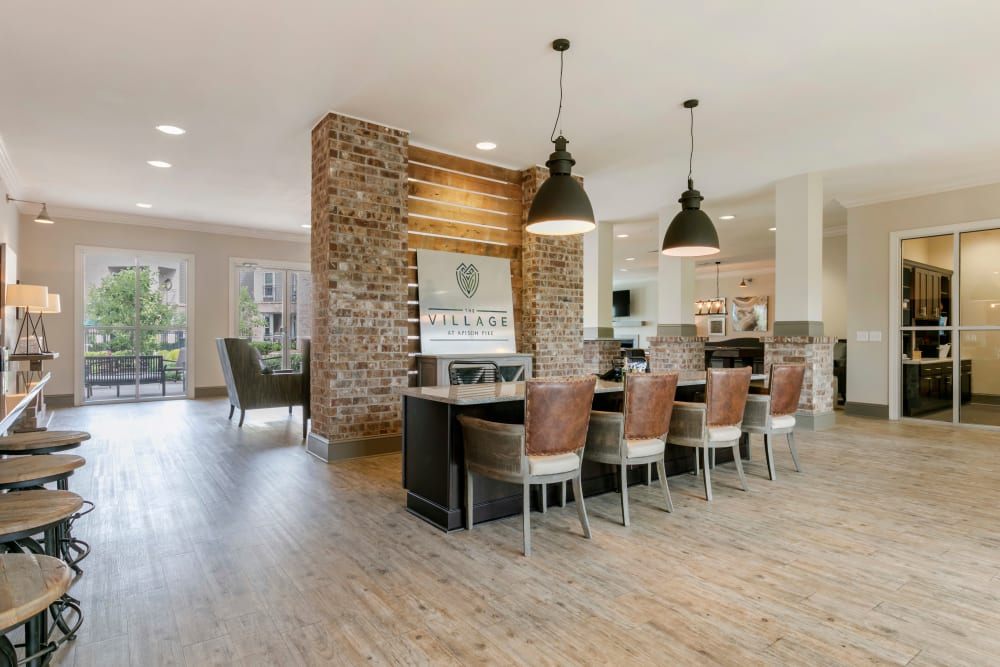 Resident lounge with counter seating perfect for remote work at The Village at Apison Pike in Ooltewah, Tennessee