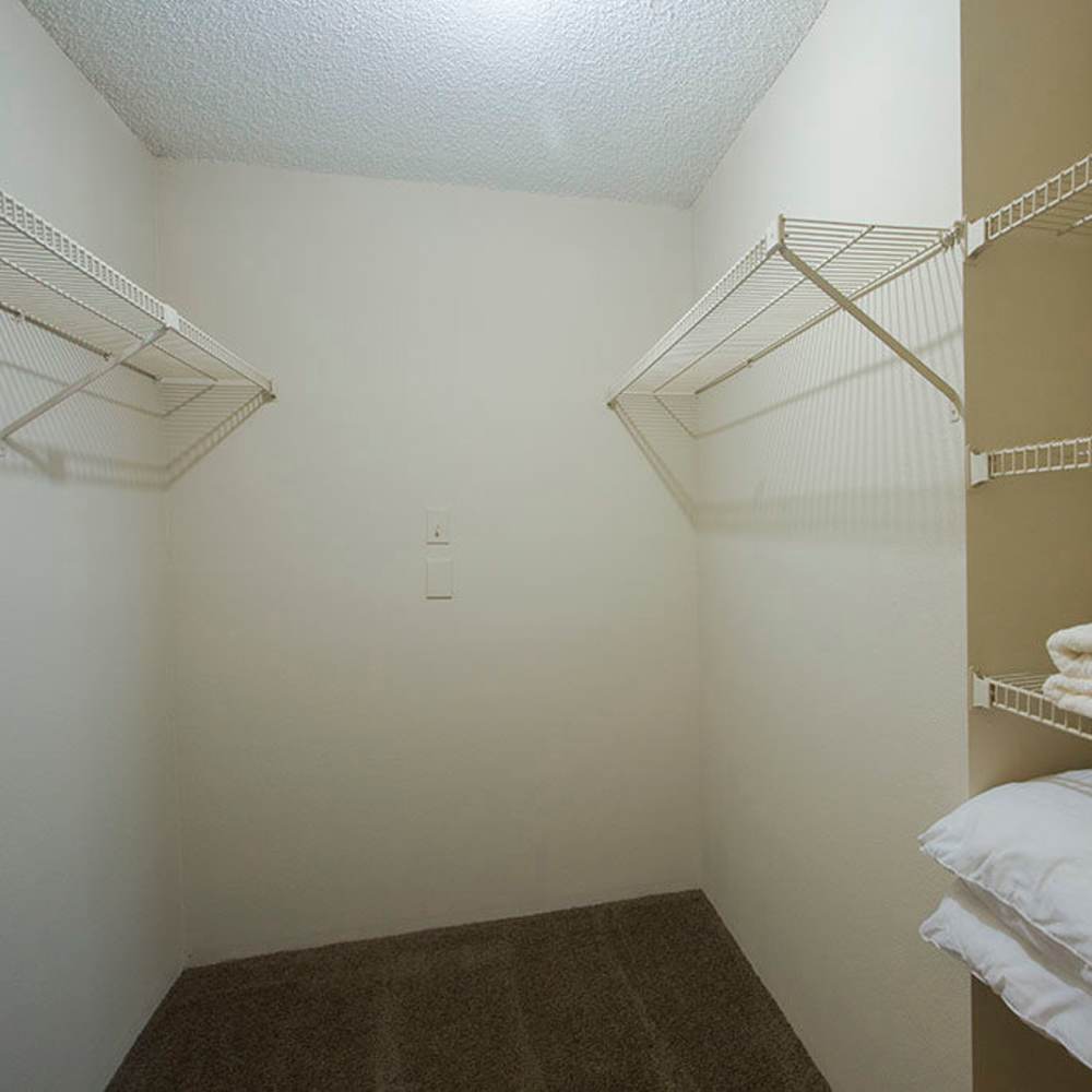 Spacious storage area with wire shelving at Park Place Apartments in Port Richey, Florida.