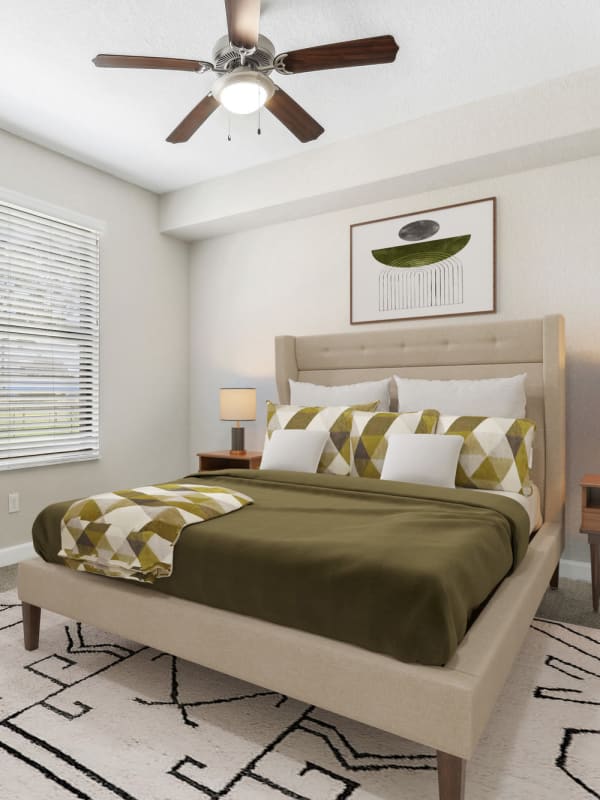 Bedroom with ceiling fan at Lantower Westshore in Tampa, Florida