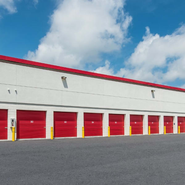 A row of drive-up storage units at StorQuest Self Storage in Parrish, Florida