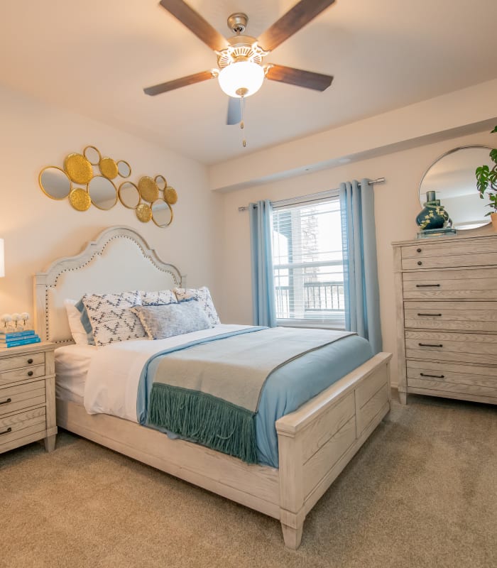 Bedroom with ceiling fan at Ridge at 66 in Yukon, Oklahoma