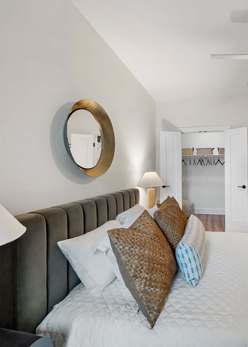 Bedroom with attached closet at The Acorn on Person Street in Raleigh, North Carolina