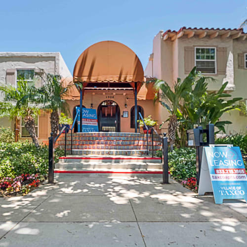 Steps leading up to the leasing office at Village of Taxco in San Jose, California