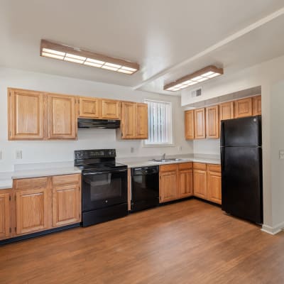 A kitchen with appliances at Carpenter Park in Patuxent River, Maryland