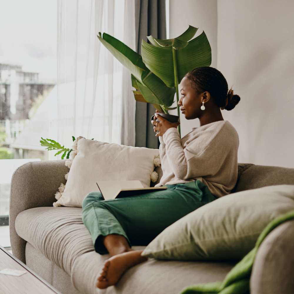 Resident relaxing at home of Lake House in Los Angeles, California
