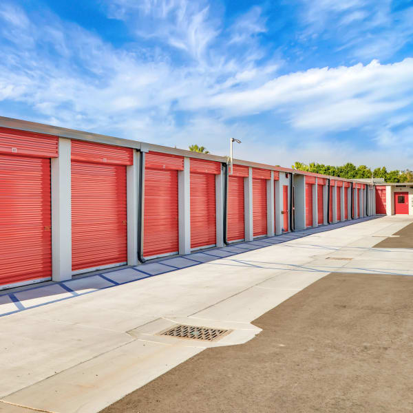 A row of drive-up storage units at StorQuest Express Self Service Storage in Gainesville, Florida
