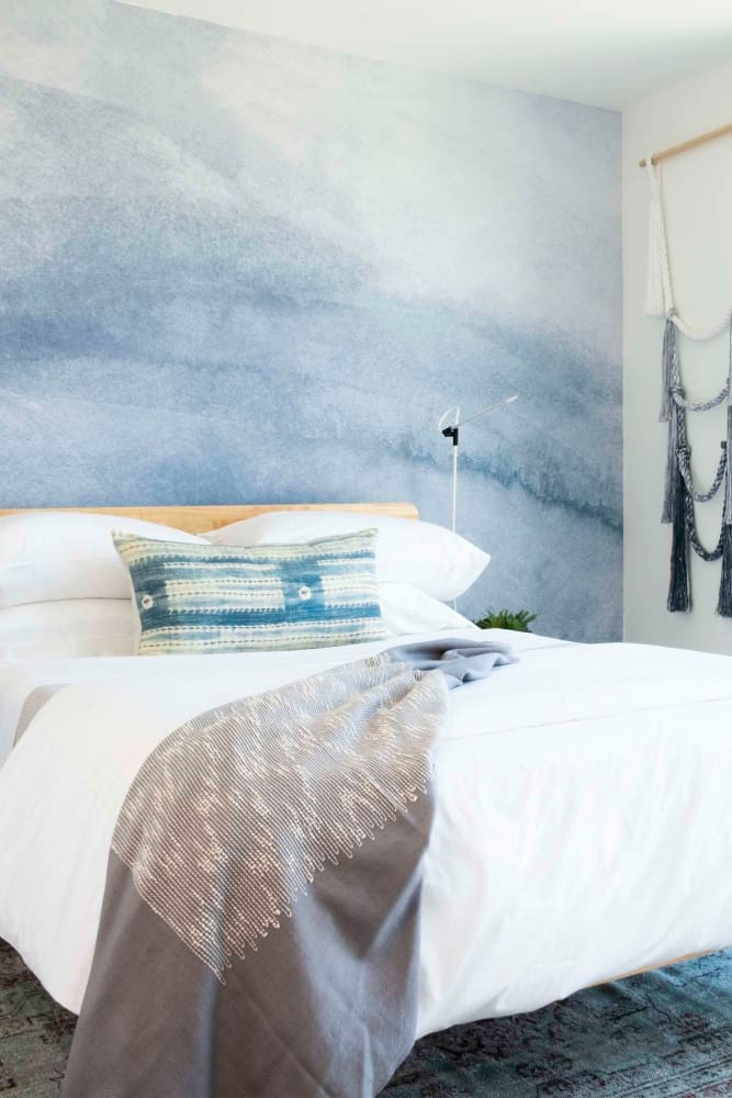 Bedroom with an accent wall at 188 Octavia in San Francisco, California