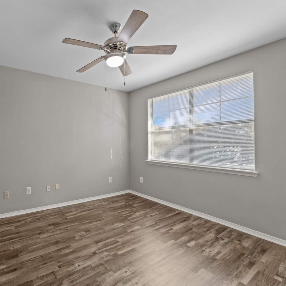 Bedroom with a window at Burkburnett Residences in Burkburnett, Texas