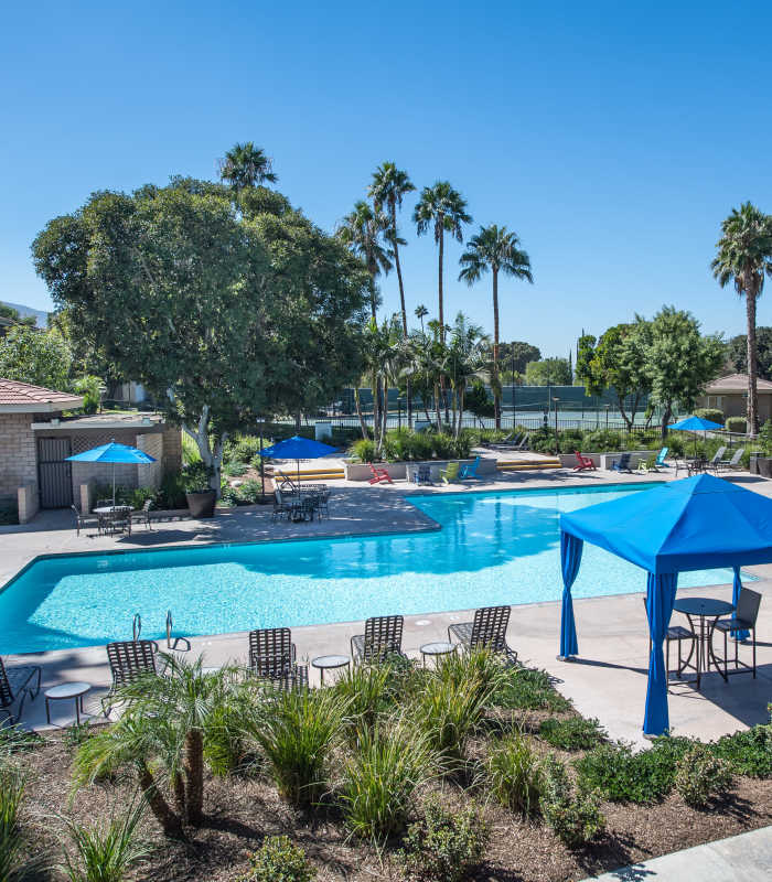 Swimming pool area at Parcwood Apartments in Corona, California