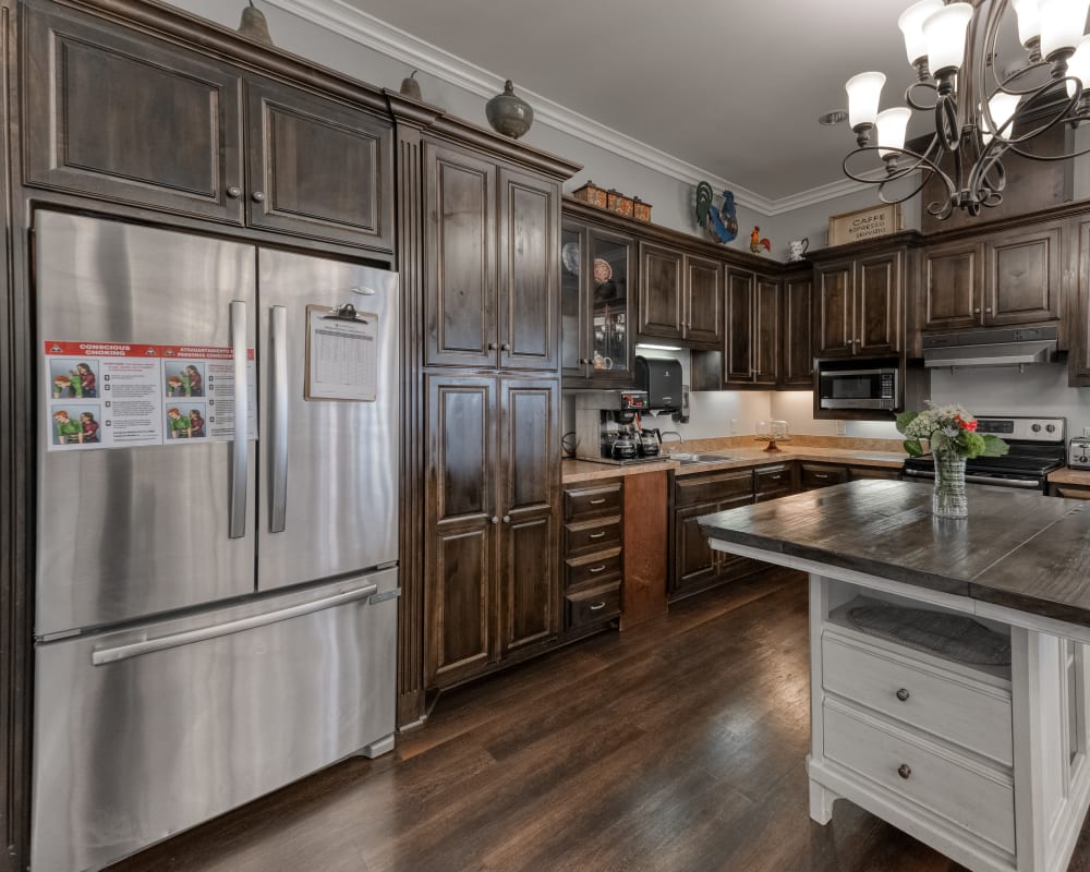Senior apartment kitchen at Addington Place of Shoal Creek in Kansas City, Missouri.