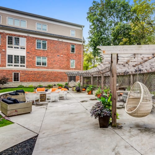 Firepit and outdoor lounge area at 933 The U in Rochester, New York