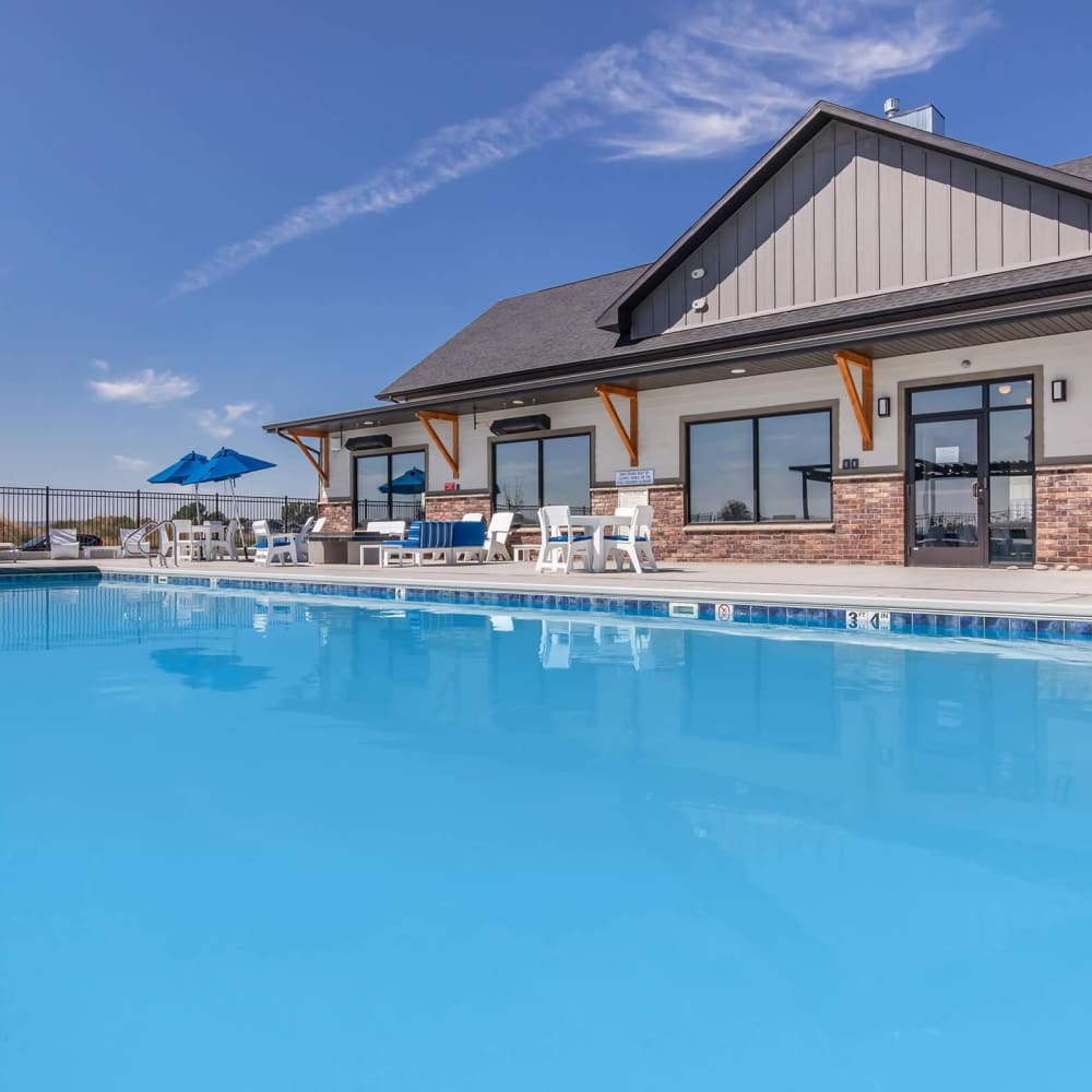 Swimming pool with lounge area at InterUrban 2.0 in Billings, Montana