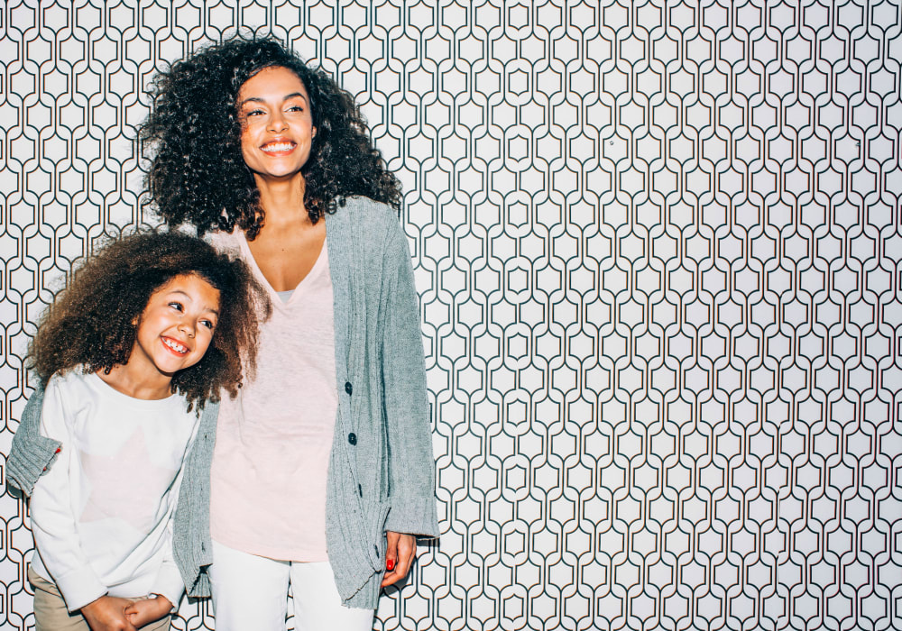 Resident mother and daughter posing for a photo at Sofi at Los Gatos Creek in San Jose, California