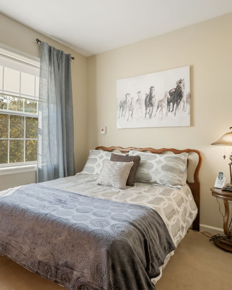 Bed in a 1 bedroom senior apartment at The Hearth at Franklin in Franklin, Tennessee