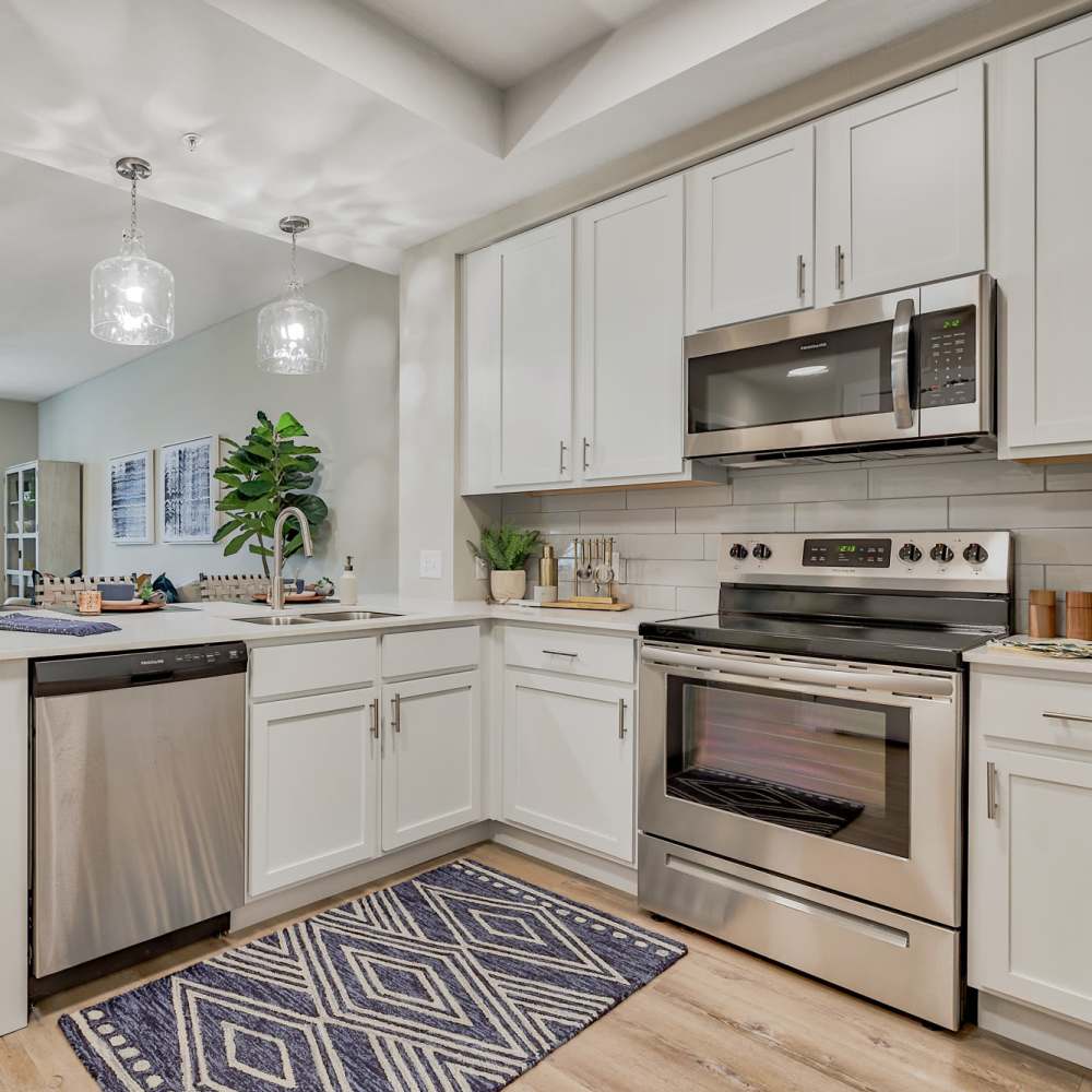 Kitchen with white cupboards at Charlotte Commons in Port Charlotte,Florida