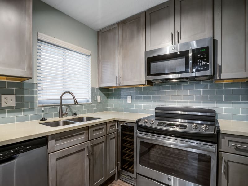 Lovely kitchen in model home at Sailpointe Apartment Homes in South Pasadena, Florida