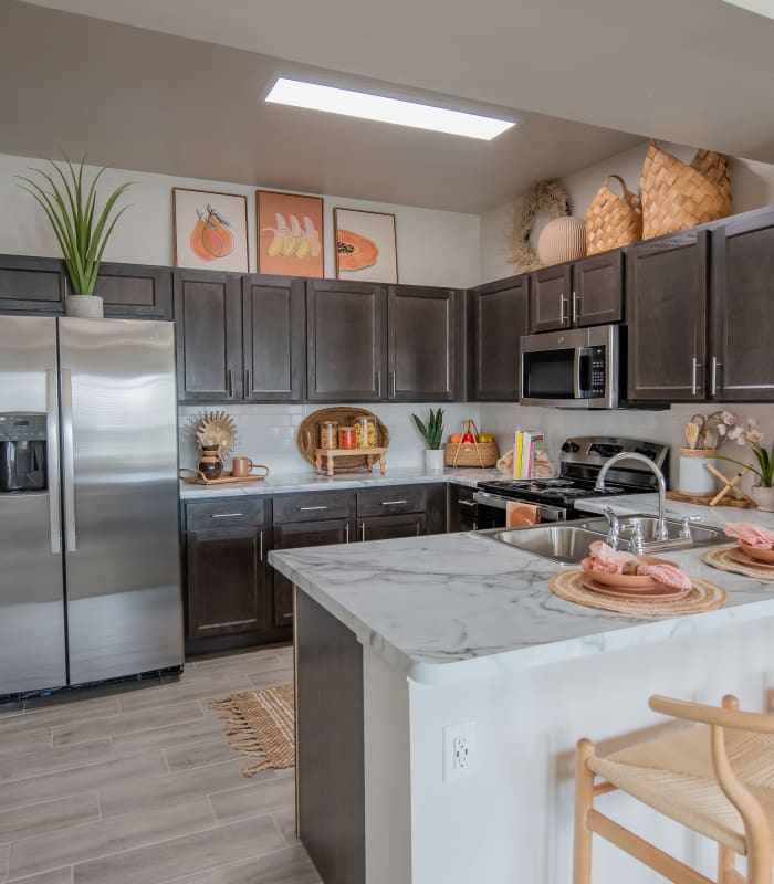 Kitchen with marble countertops at Adirondack in Independence, Missouri