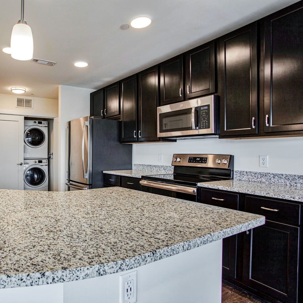 Gourmet kitchen with stainless-steel appliances at The Docks, New London, Connecticut