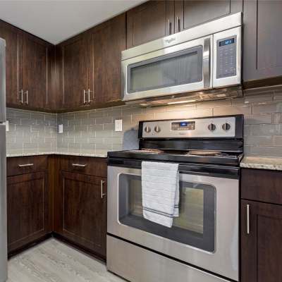 Kitchen with wooden flooring at The Allara Apartments, Boynton Beach, Florida