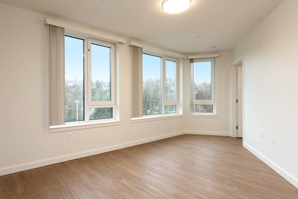 Living area with vinyl plank flooring at Gardner House in Seattle,Washington