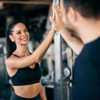 Residents working out in the fitness center at Seacrest in Katy, Texas