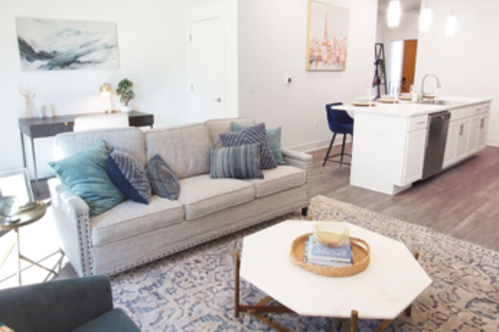 A living room space with sofa and coffee table at Ravello 192 in Elkhorn, Nebraska