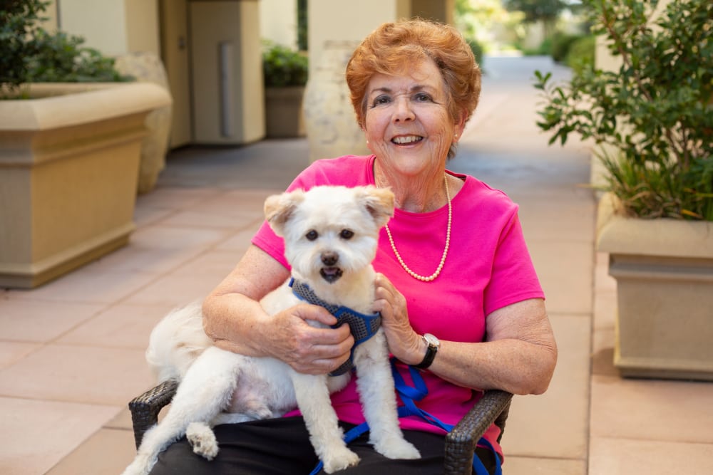Resident and pet at our senior living community