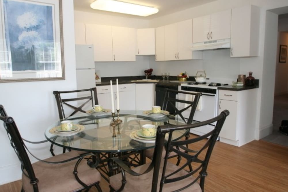 Combo dining room and kitchen at The Fairways Apartments and Townhomes in Thorndale, Pennsylvania