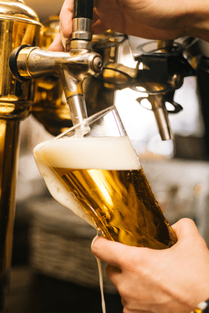 Pouring a beer at Factory 52 Apartments in Norwood, Ohio