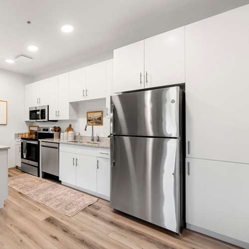 Kitchen with stainless steel appliance at Olympus at Arroyo Verde in Tucson, Arizona