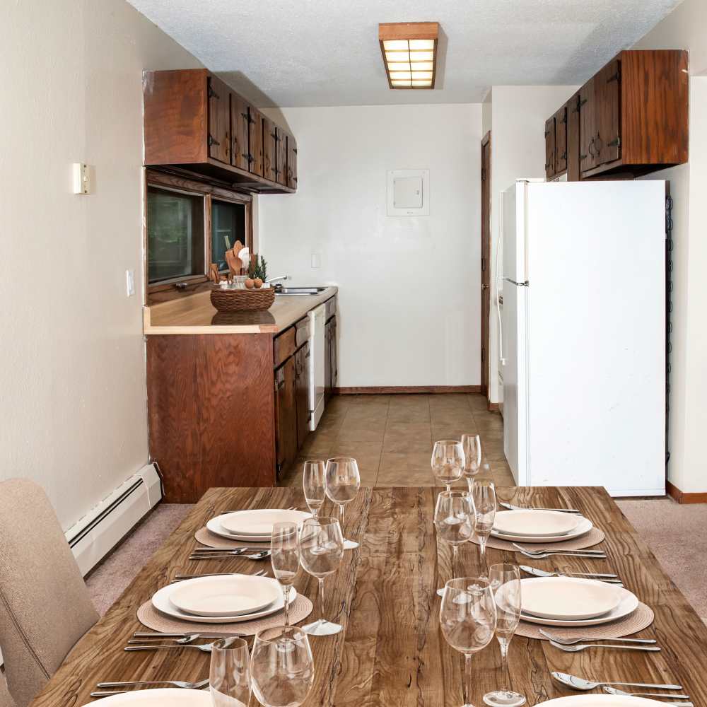 Wooden dining table at Bass Lake Crossing in New Hope, Minnesota