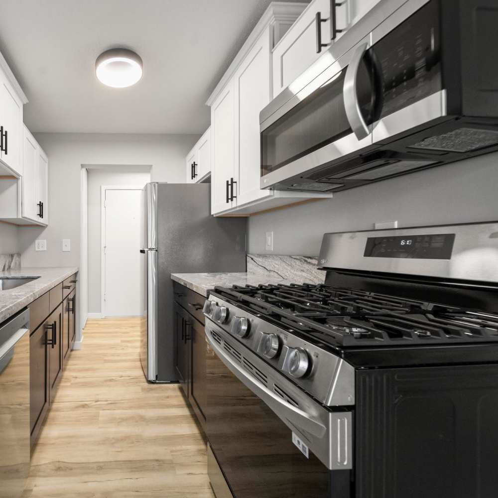 Well-equipped kitchen with stainless-steel appliances at Morada in Crystal, Minnesota