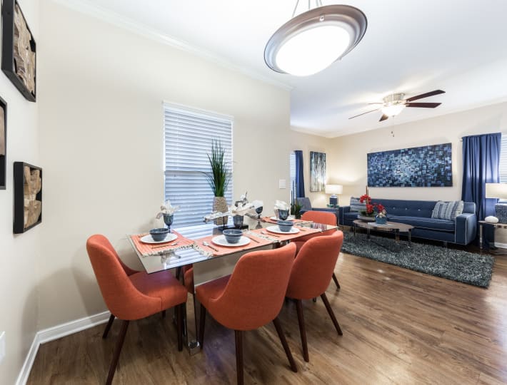 Modern living room and spacious dining room at Pavilions at Northshore in Portland, Texas