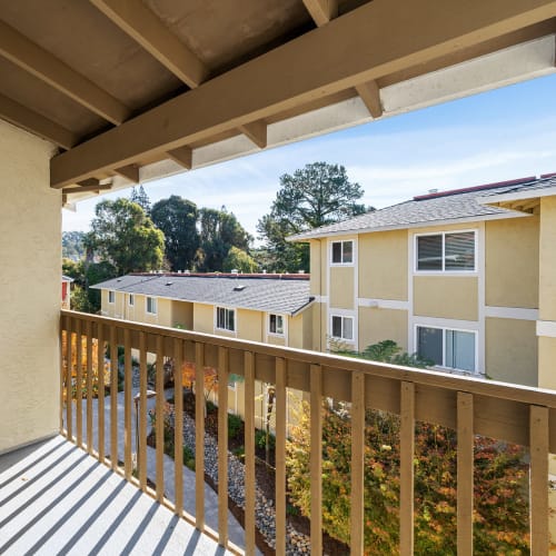 Private balcony with courtyard views at Vista Creek Apartments in Castro Valley, California