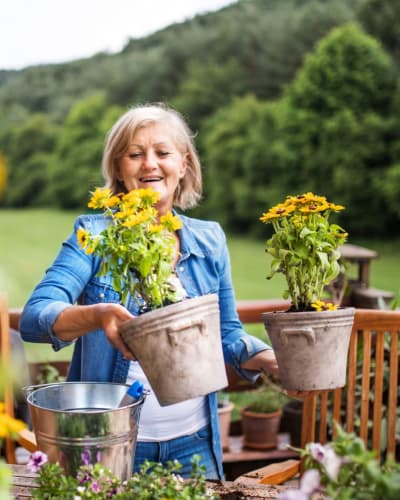 Resident gardening at Trustwell Living at Bell Gardens Place in Hillsboro, Ohio