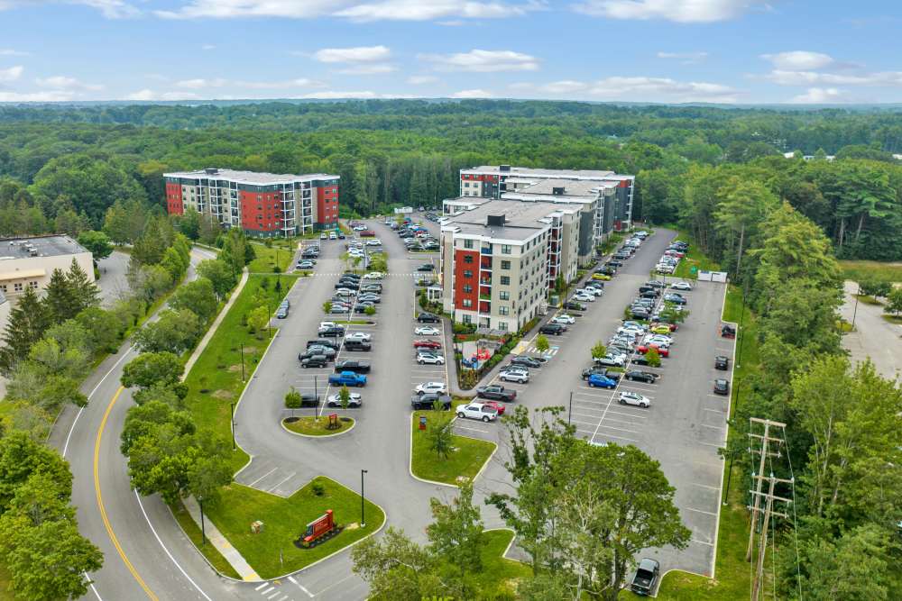 Aerial view of apartment buildings and parking lot at Latitude at South Portland in Portland, Maine