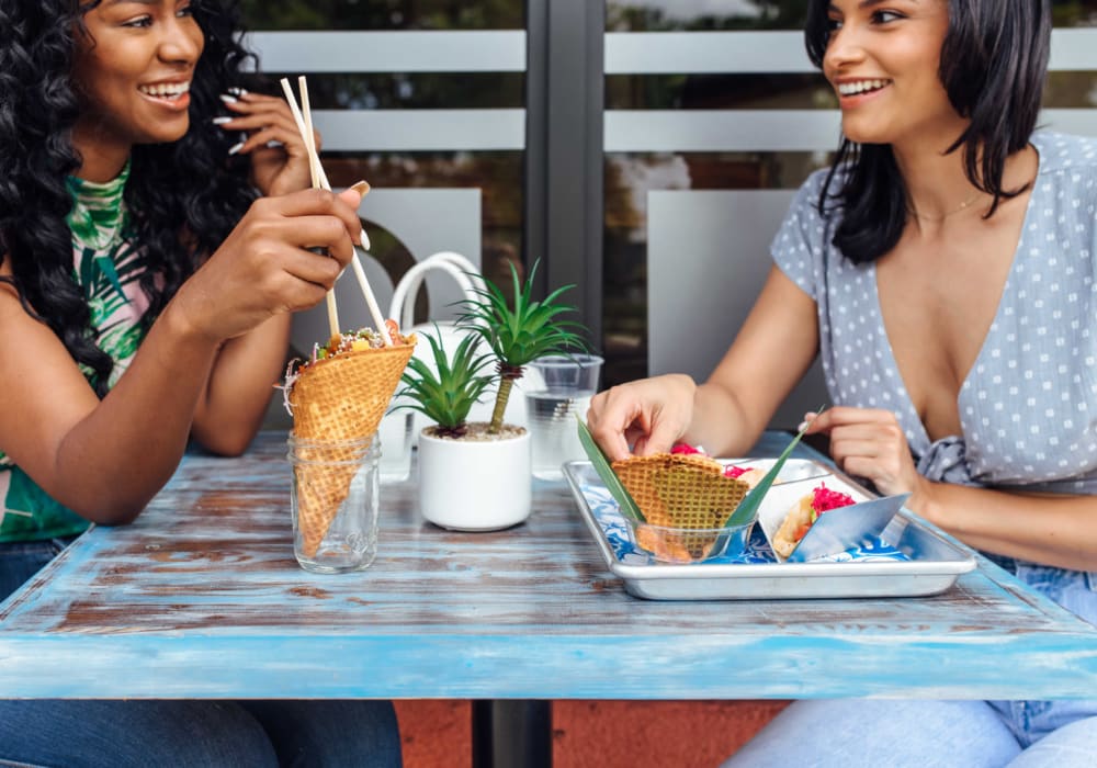 Residents eating lunch together at Motif in Fort Lauderdale, Florida