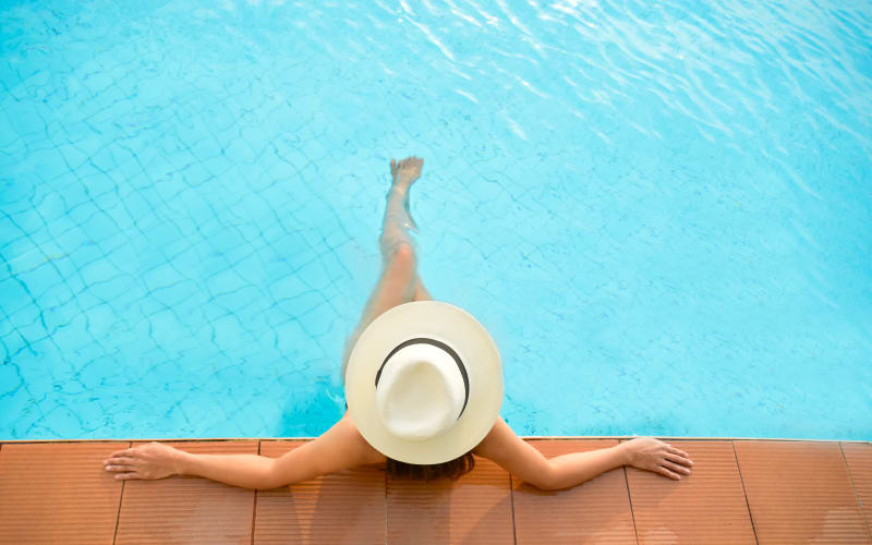 Resident in the swimming pool at Turtle Creek Vista Apartments in San Antonio, Texas
