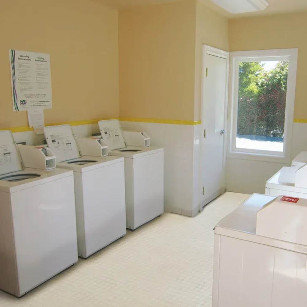 On-site laundry facilities at Bluffs at Evergreen in Everett, Washington