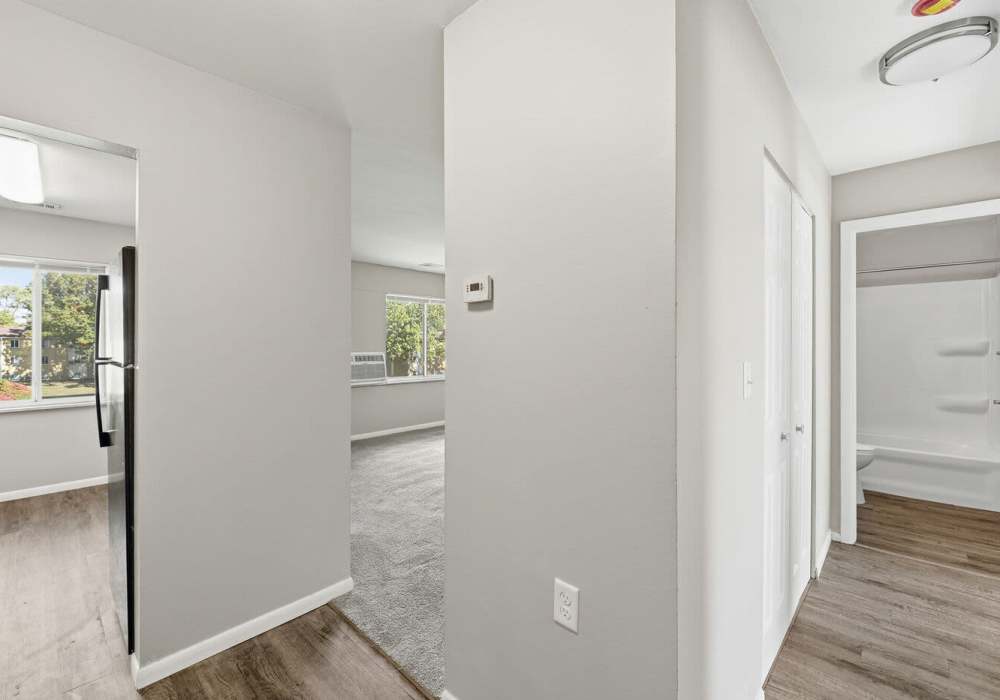 Unfurnished living room featuring hardwood floors at Pin Oak Manor Apartments in Mishawaka, Indiana