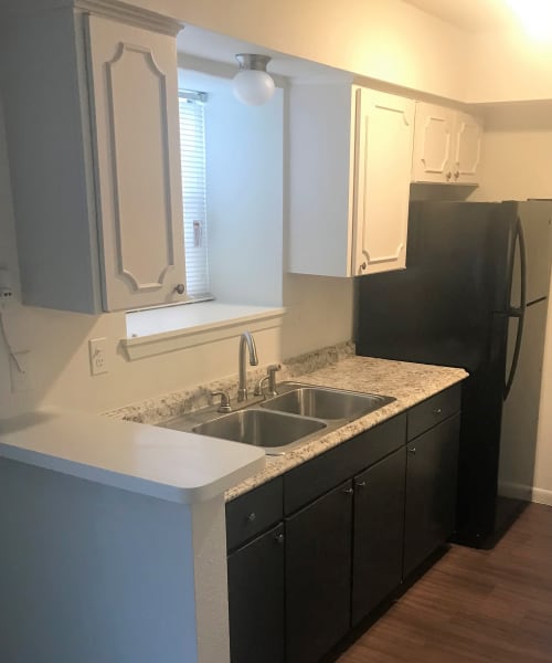 Apartment kitchen at Arbors on 31st in Bryan, Texas