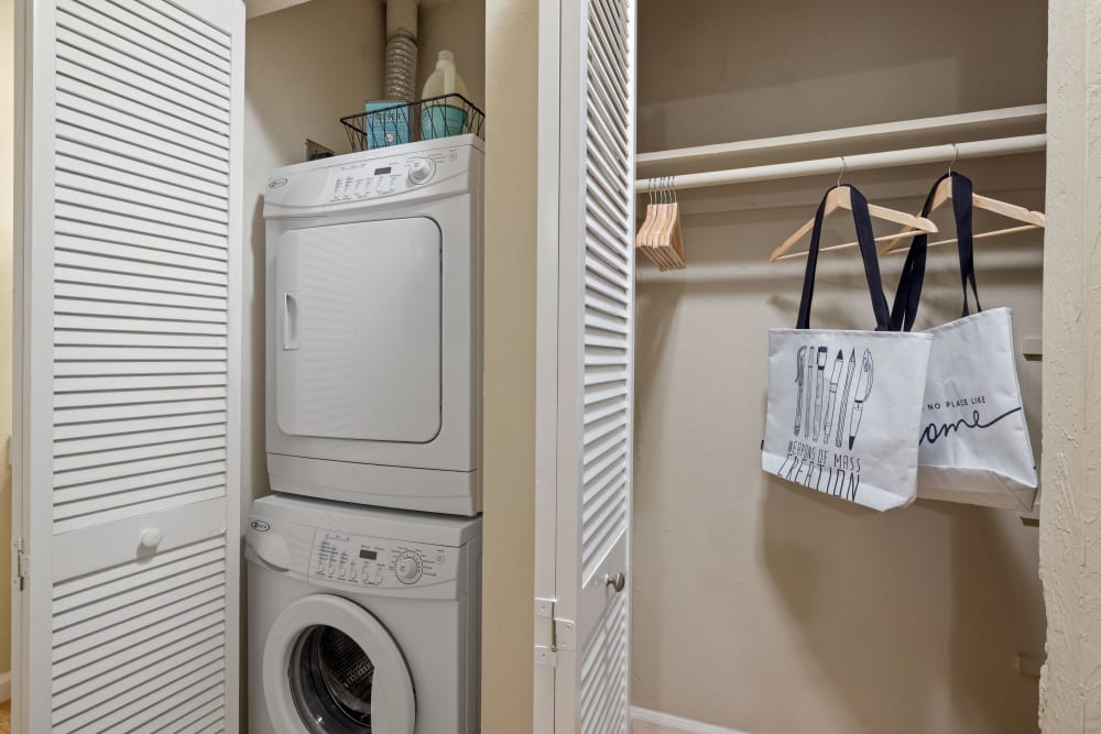 Laundry area with rack for clothes at Montecito Apartments in Santa Clara, California