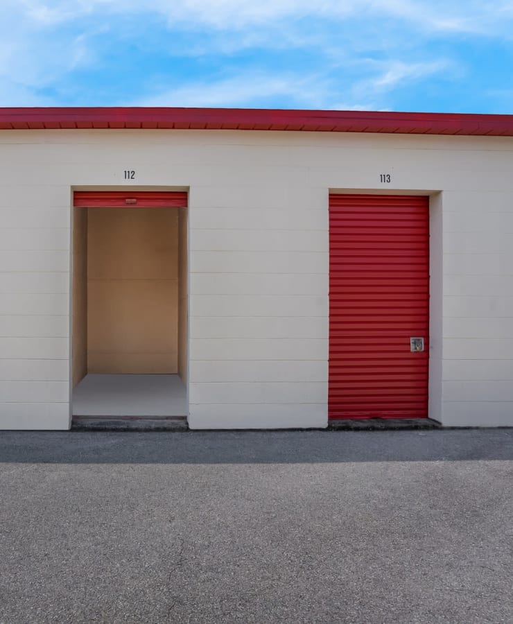 An open storage unit with drive-up access at StorQuest Express Self Service Storage in Gainesville, Florida