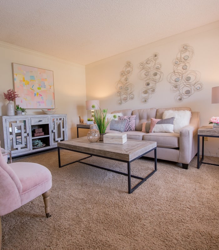 Carpeted living room at Summerfield Place Apartments in Oklahoma City, Oklahoma